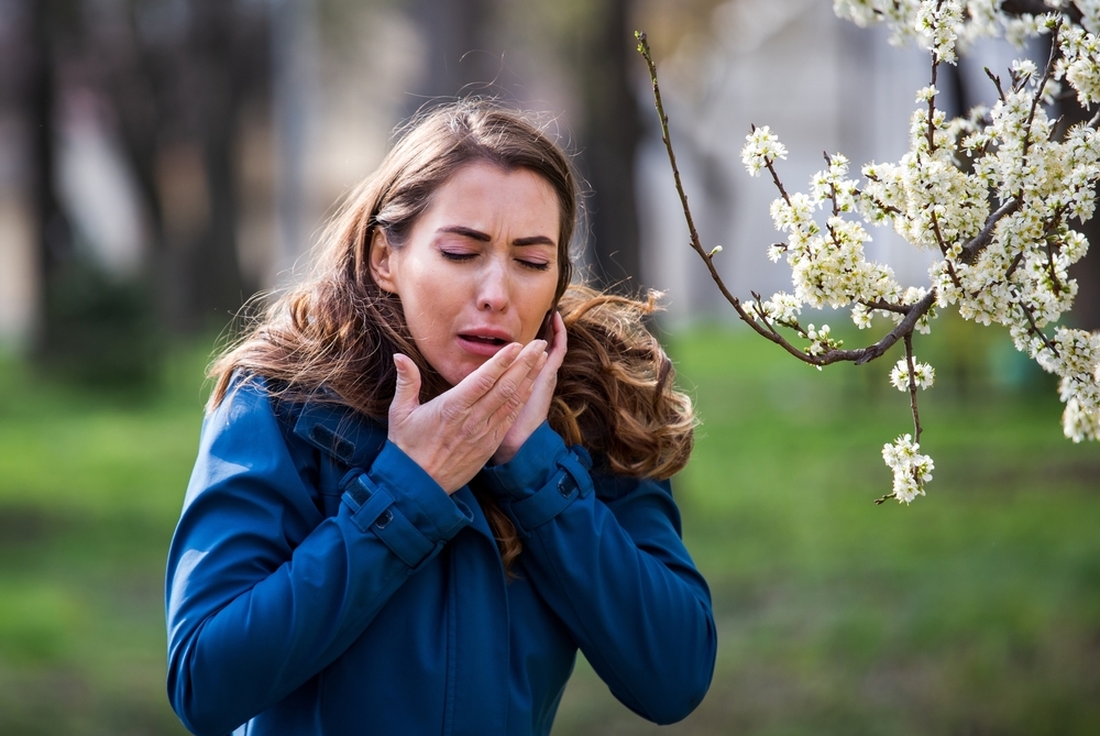 Pretty,Young,Woman,Sneezing,And,Having,Alergy,Symptoms,From,Blooming